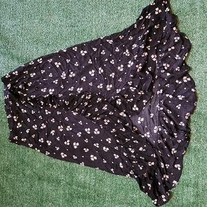 American eagle ruffle trim wrap skirt with daisy pattern